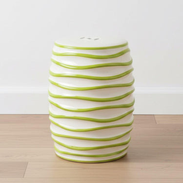 Ceramic Stool styled as a vibrant ceramic accent table from Woodka Interiors