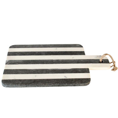 Black and white striped cutting board with a handle 