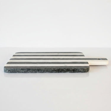 Marble serving board with black and white stripes 