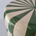 Close-up of the Striped Ceramic Side Table – Green showing the glossy ceramic finish
