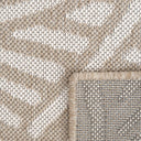Suntan fully outdoor runner with wave patterns close-up of a textured beige and white