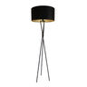 Black tripod floor lamp with metal base and black cotton drum shade
