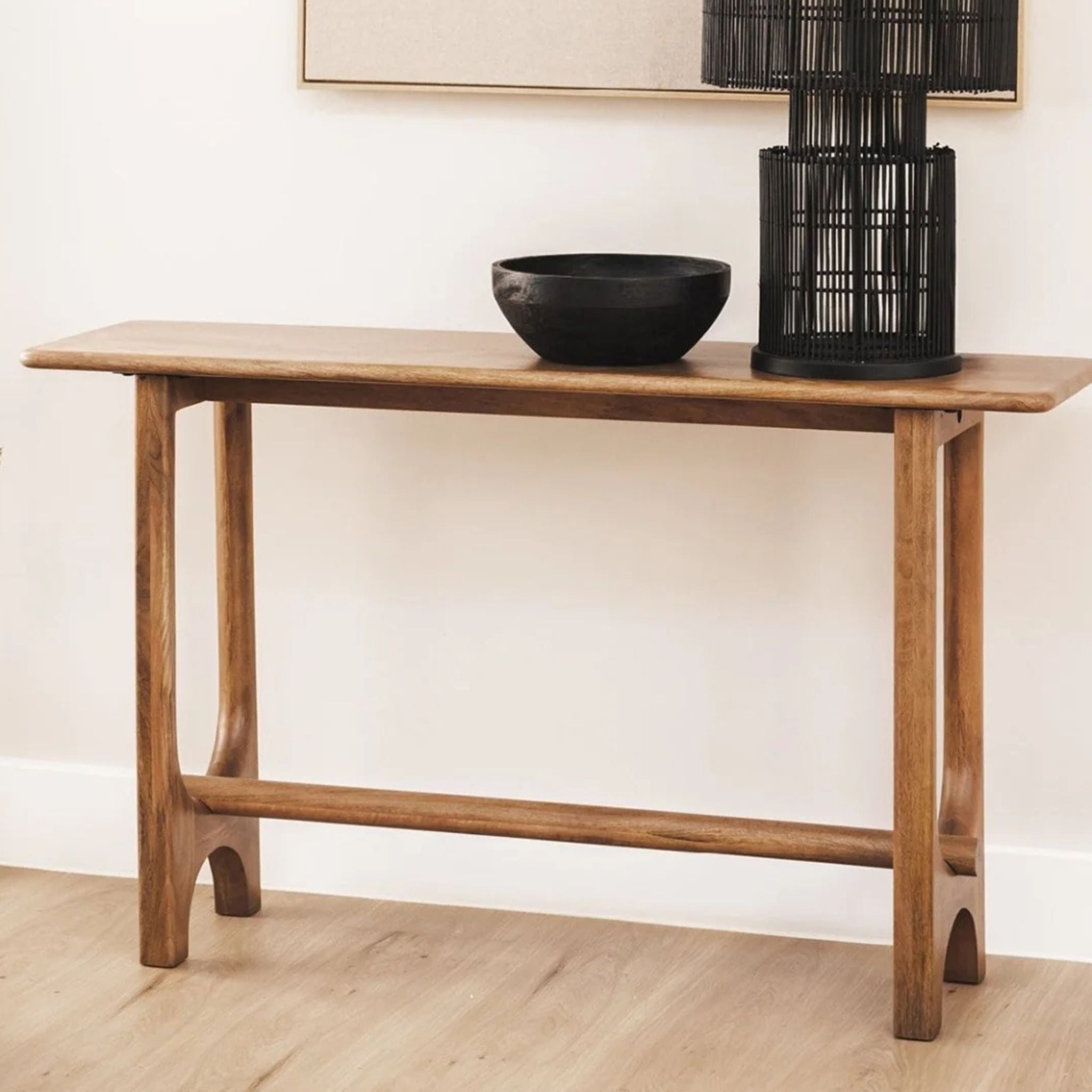 Tubular wood console table in nutmeg finish, a slim rectangular top and legs with curved, tubular joinery