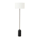 verona floor lamp with a white cylindrical shade and a dark base made of marbled black material