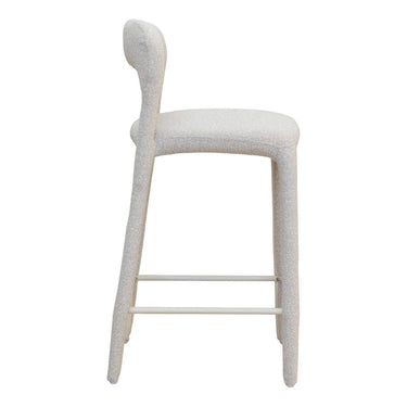 A off white textured fabric bar stool with a curved back and four legs connected by a black footrest.