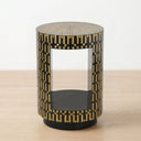 side table with a black and natural geometric inlay pattern, featuring a clear open space on the front and a black circular base.