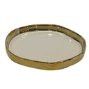 Irregular white and gold ceramic vanity tray.