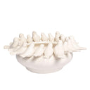 Angled view of White Ceramic Birds Bowl highlighting soft pearl-cream smooth textured finish