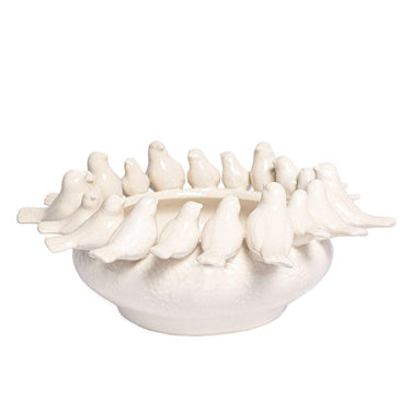 Angled view of White Ceramic Birds Bowl highlighting soft pearl-cream smooth textured finish