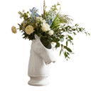 White ceramic horse head knight chess piece vase with flowers 