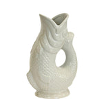 White ceramic koi fish jug vase with a handle.