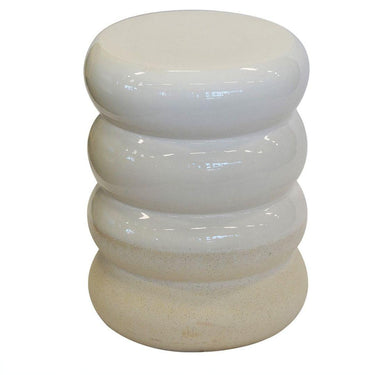 White ceramic stool with stacked ring design on a white background
