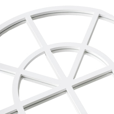 Close-up of coastal farmhouse arched window pane mirror glass framed in white windowpane panels