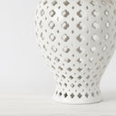 Close-up of the lattice cutout detail on the White Ginger Jar Lamp showing the unique ceramic lamp texture
