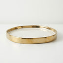 Irregular white and gold ceramic vanity tray.
