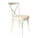 White cross back bistro chair with ivory cushion and bentwood frame for coastal dining.