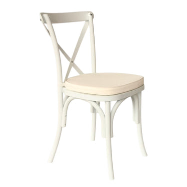 White cross back bistro chair with ivory cushion and bentwood frame for coastal dining.