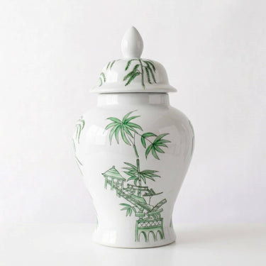 Willow white ceramic ginger jar with lid featuring green hand-painted bamboo and pagoda patterns.