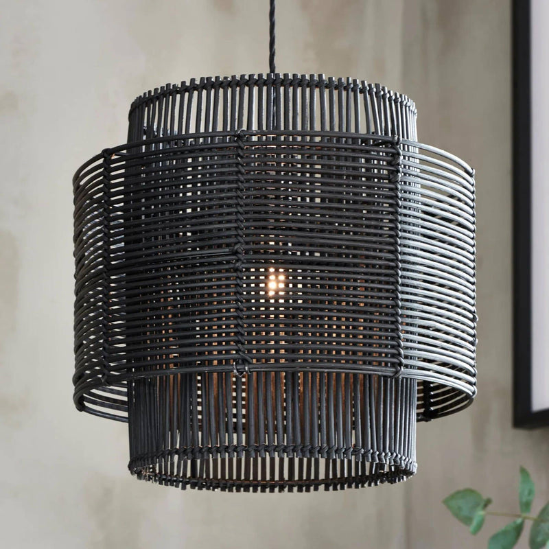 woven black pendant lamp with intricate detailing, ideal for stylish home decor.