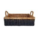 Side view of small basket tray highlighting handwoven detail and sturdy construction