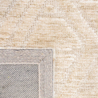 Close-up view of the Xanadu Parchment rug fibres, the soft polyester pile texture and the subtle colour variations within the geometric linework.