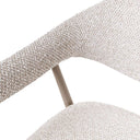 Close-up of oats textured fabric upholstery and curved wraparound armrest design.