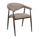 Side view of the Yvette dining chair with curved wraparound armrest, a curved backrest and textured coco brown boucle-style fabric upholstery.