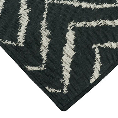 Zagzi Black Rug showcasing contemporary herringbone motif