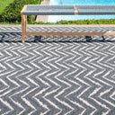 Zagzi Grey Rug styled poolside outdoors