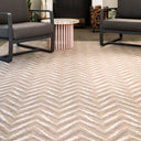 Zagzi Sand Rug styled on an outdoor patio setup with moder furniture