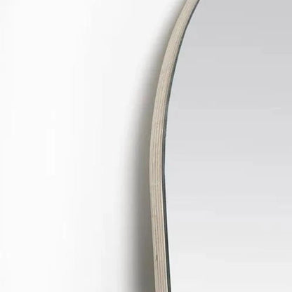 Leaning arched floor mirror